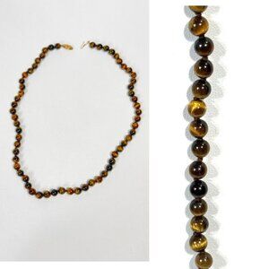 14K filagree fishhook clasp and 5 MM tiger eye 16" necklace.